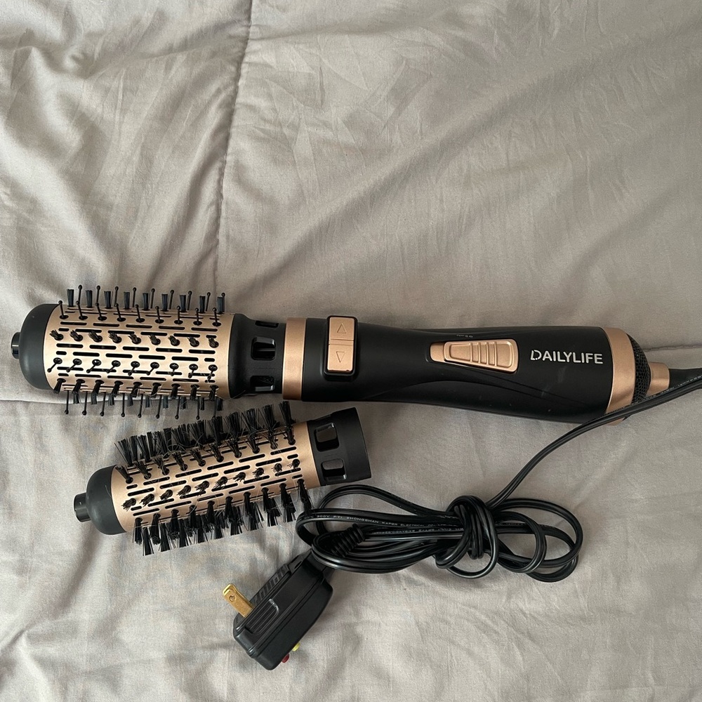 Hot blow dry brush.  2 attachments  like new. Used once.